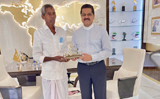 Padma Shri recipient Harekala Hajabba honored by Dr. Thumbay Moideen at Thumbay Medicity